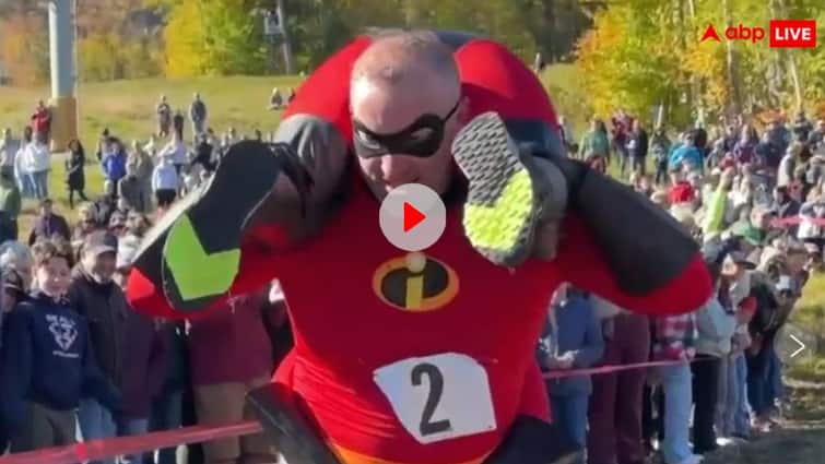 Husband races carrying his wife on his shoulders as part of North American Championship